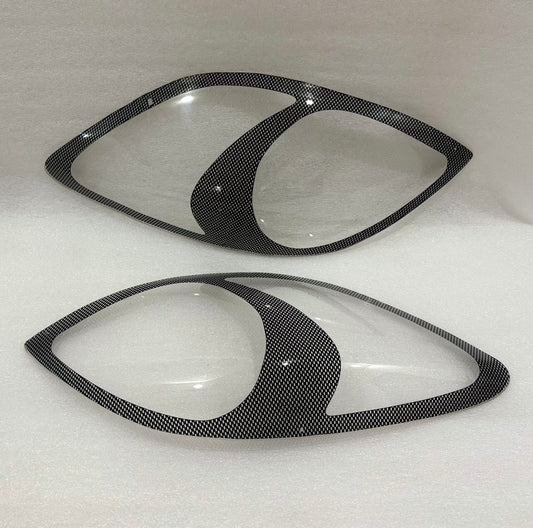 Toyota Yaris Hatch carbon Headlight shields 2006-2011