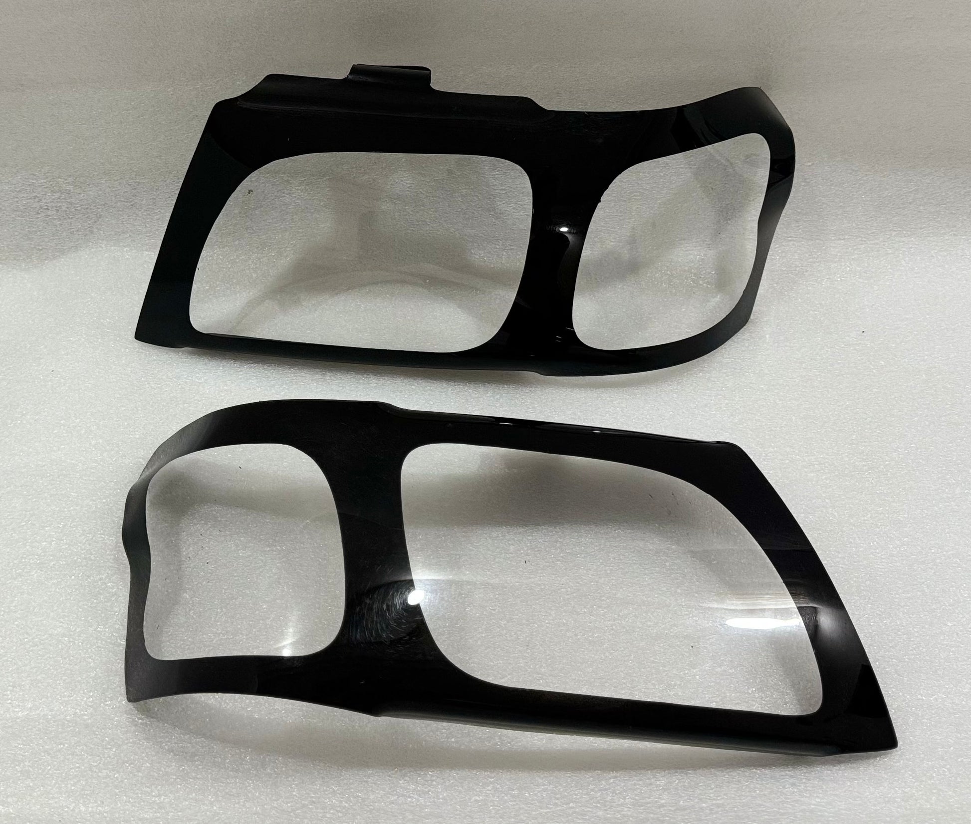 Toyota Hilux Gloss Black Headlight shields 02-05
